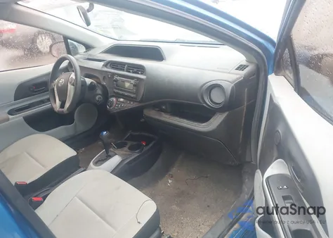 2013 Toyota Prius C One from USA, damaged, VIN JTDKDTB37D1538443